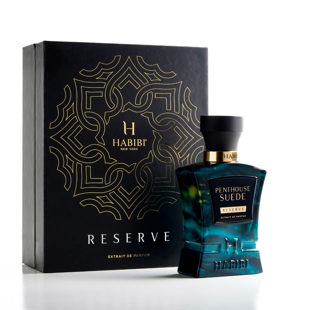 Penthouse Suede scents: A luxurious perfume in a blue bottle, presented in a sleek black box for a sophisticated touch