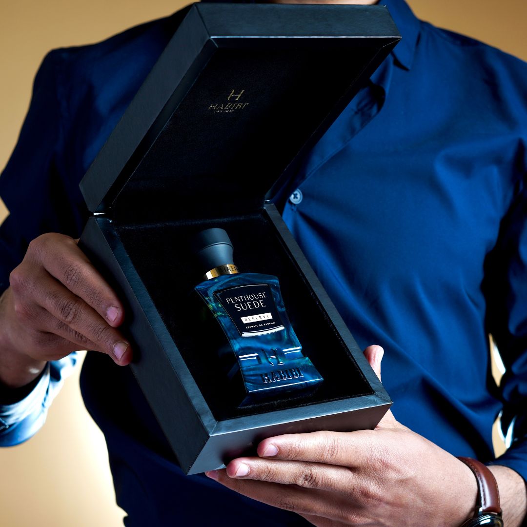 Penthouse Suede scents: A luxurious cologne in a blue bottle, presented in a sleek black box