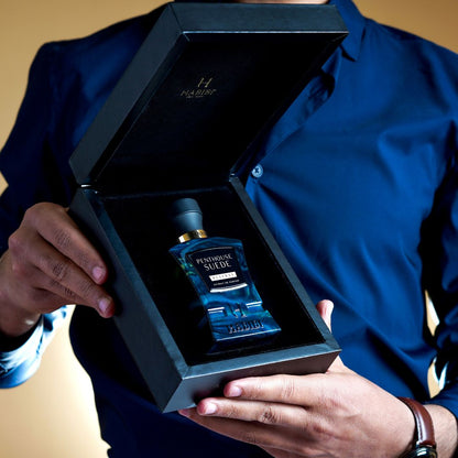Penthouse Suede scents: A luxurious cologne in a blue bottle, presented in a sleek black box