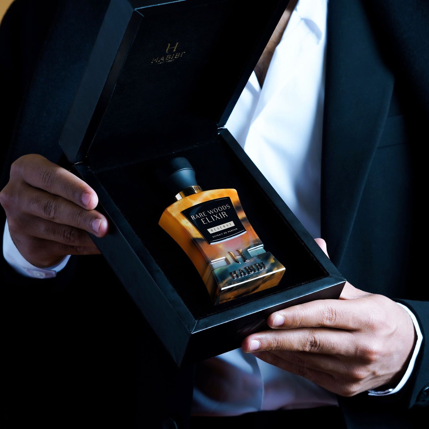 Rare Woods Elixer fragrance in a black box
