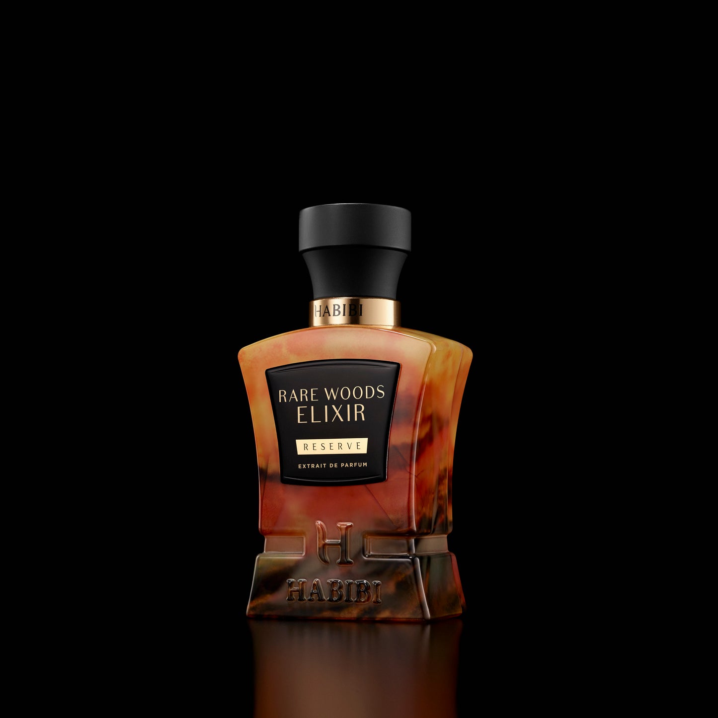 Rare Woods Elixer perfume in a brown bottle