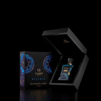 Penthouse Suede scents: A luxurious fragrance in a blue bottle, presented in a sleek black box for a sophisticated touch