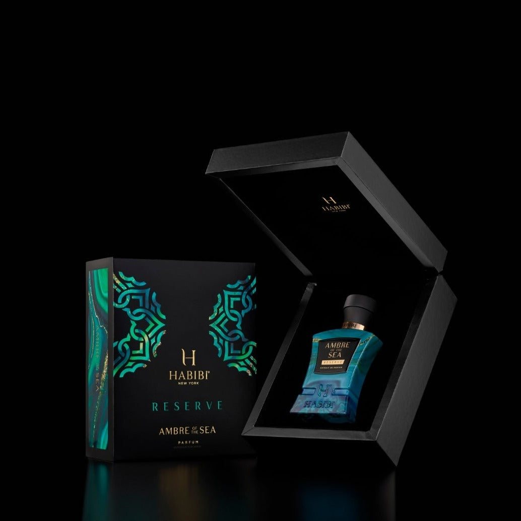 Blue bottle of Ambre of the Sea perfume by Habibi New York.