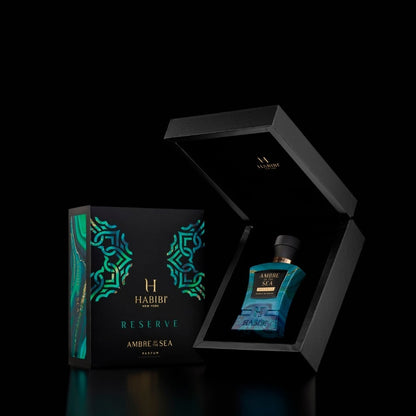 Blue bottle of Ambre of the Sea perfume by Habibi New York.