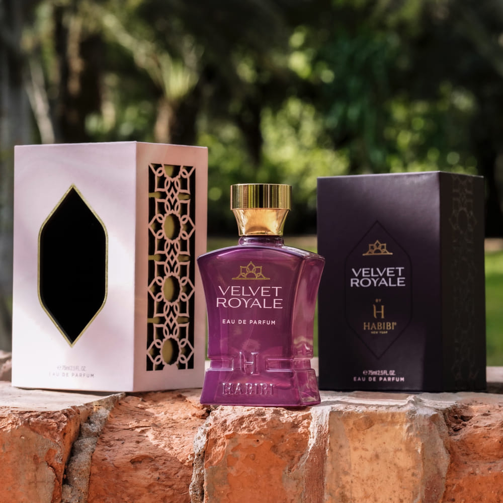 Velvet Royale fragrance by Habibi New York in a purple bottle with its packaging box.