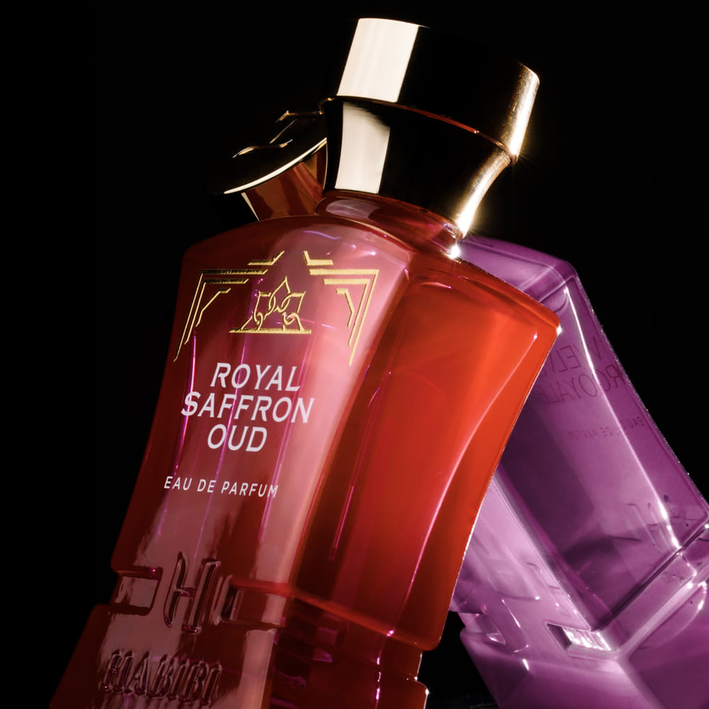 Luxurious Royal Saffron Oud: perfume in red and purple bottle by habibi new york