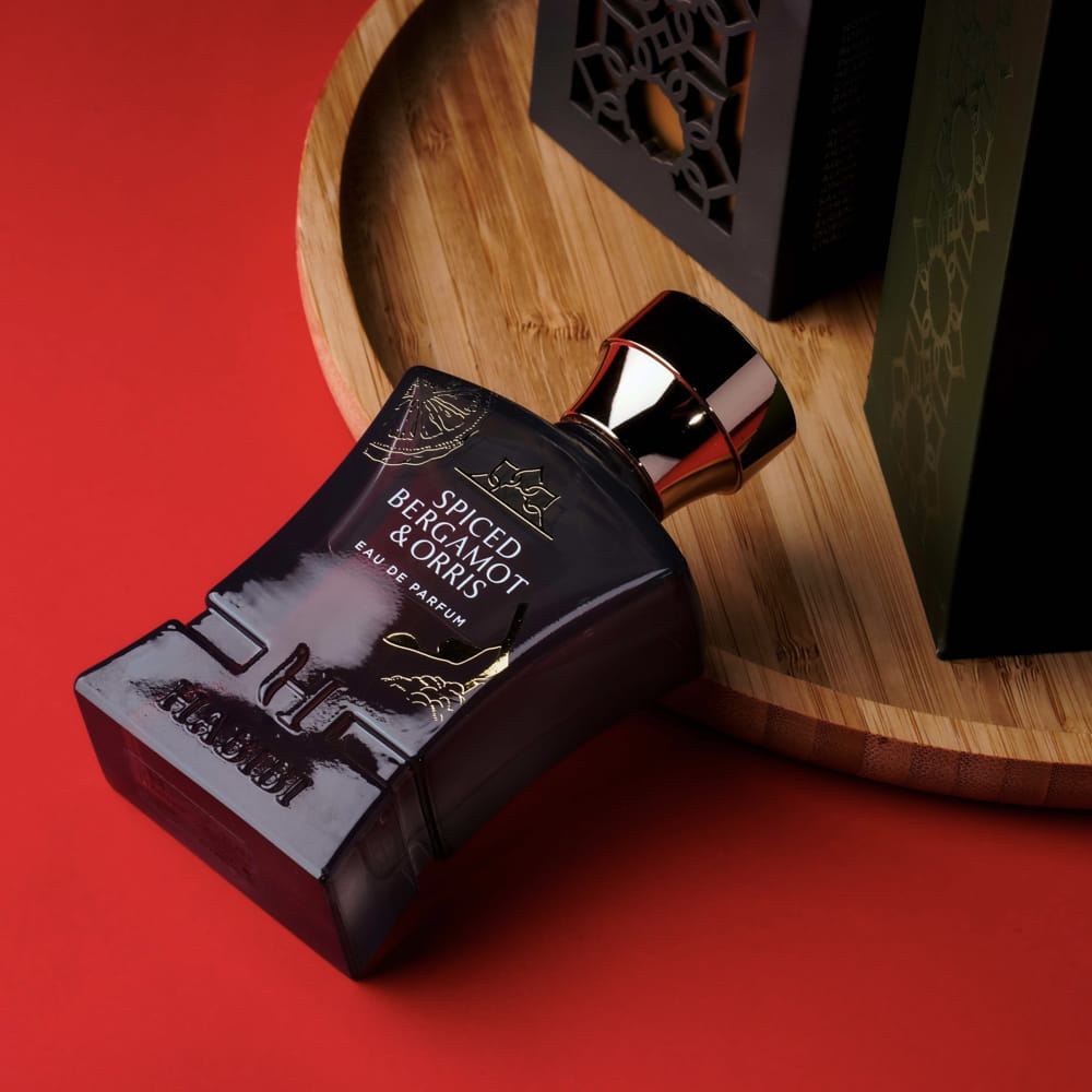 Spiced Bergamot & Orris Perfume in a Dark green bottle of by Habibi NY.