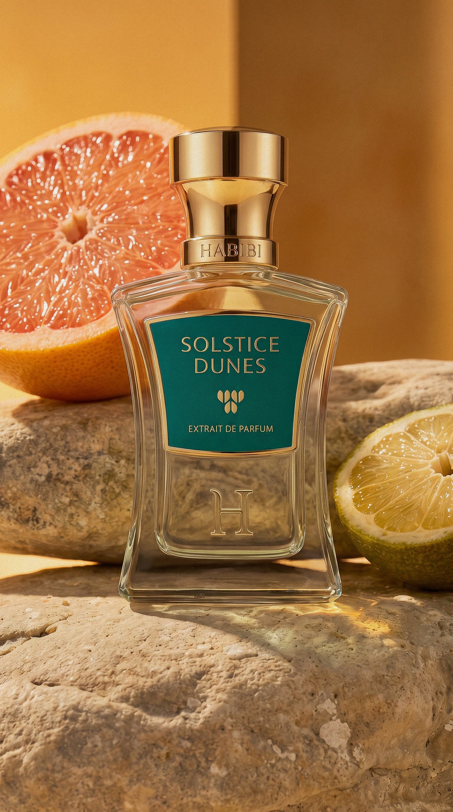 Solstice Dunes Extrait de Parfum on warm desert stone with grapefruit and lemon — Habibi New York