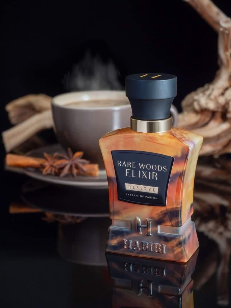 Rare Woods Elixer scent in a brown bottle